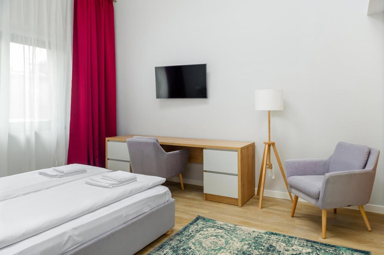 H11 Downtown Apartments เตอร์กู-มูเรช ภายนอก รูปภาพ