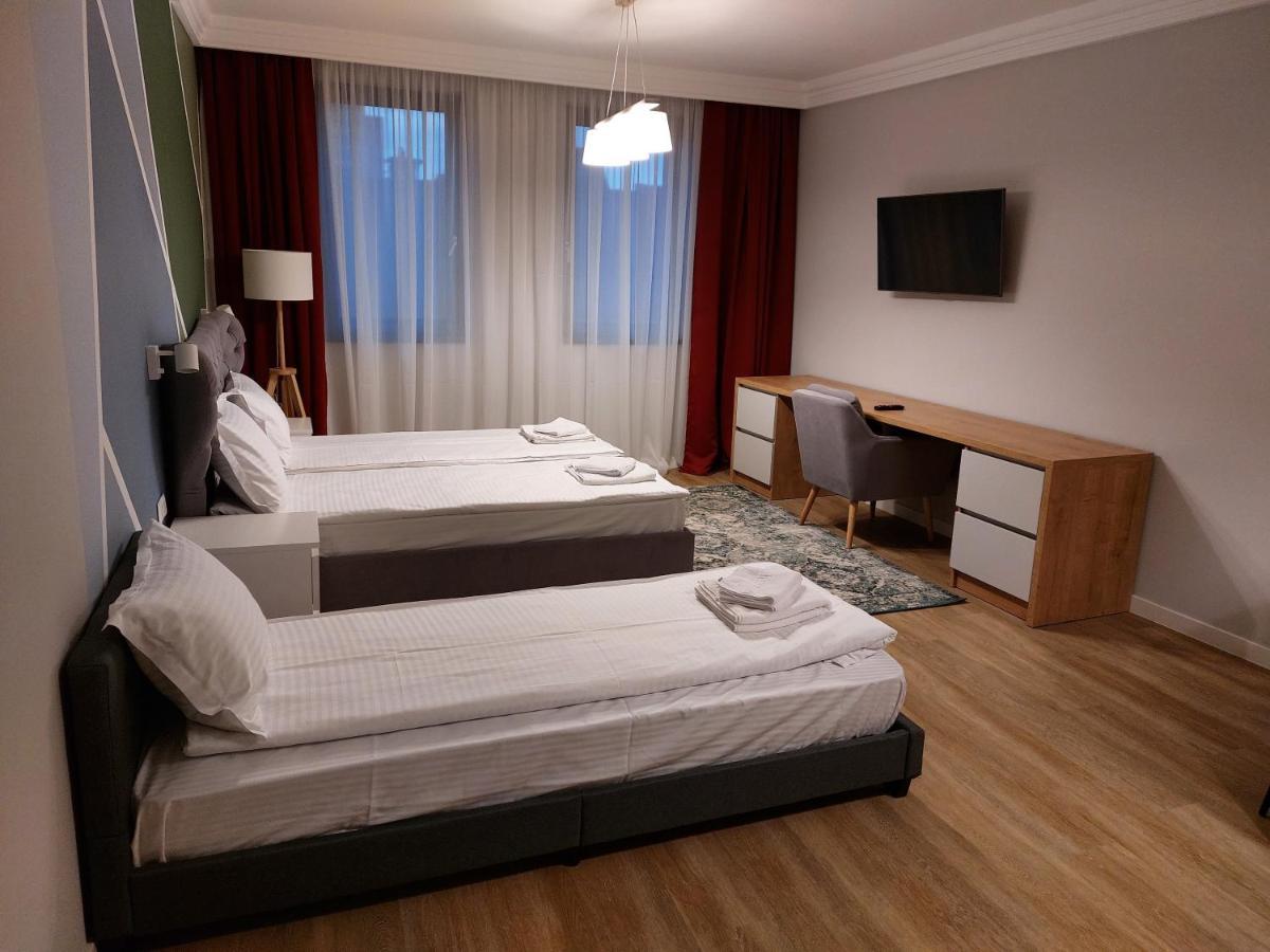 H11 Downtown Apartments เตอร์กู-มูเรช ภายนอก รูปภาพ